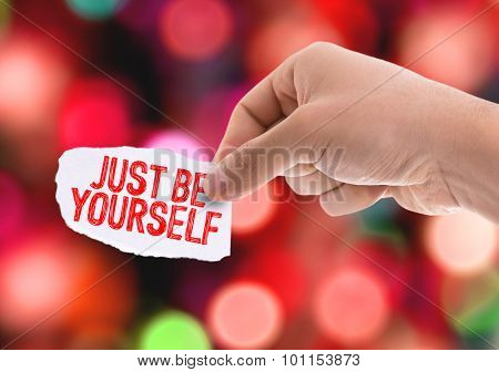 Piece of paper with the word Just be Yourself with bokeh background