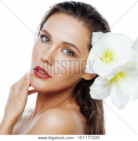 young pretty woman with  Amarilis flower close up isolated on white