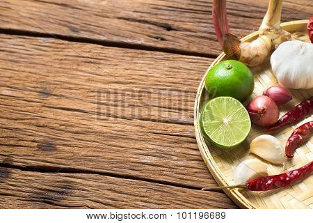Herb Ingredient Of Tom Yum Spicy Soup Traditional Thai Food Cuisine On Wood Background