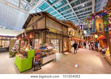 TOKYO - SEPTEMBER 1, 2015: Haneda airport at the Edo town shops. The shops sell tourists goods from Edo era recreation buildings inside the terminal.