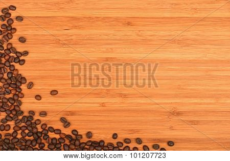 Coffee Beans Corner Over Bamboo Wood Background