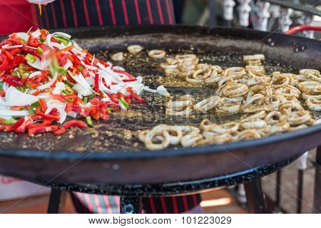 Traiditional Cuisine Traveling Uruguay, Local Paella, Squid With Onion And Pepper. South America.