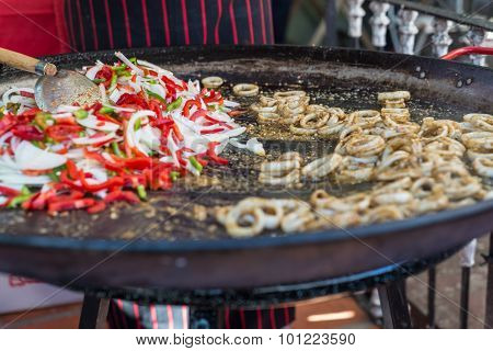 Traiditional Cuisine Traveling Uruguay, Local Paella, Squid With Onion And Pepper. South America.
