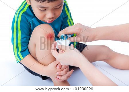 Little Asian Boy Looking Wound His Leg