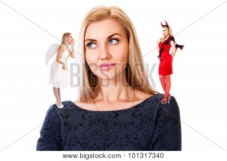 Young Woman With Small Angel And Demon On Her Shoulders