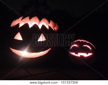 Little And Big Happy Halloween Pumpkins At Night