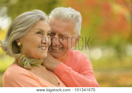Elderly couple smilling together