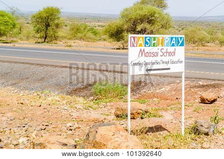 Maasai School Sign At The Road In Tanzania