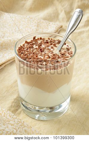 Breakfest - coffee dessert with yogurt and chocolate shavings