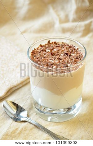Breakfest - coffee dessert with yogurt and chocolate shavings