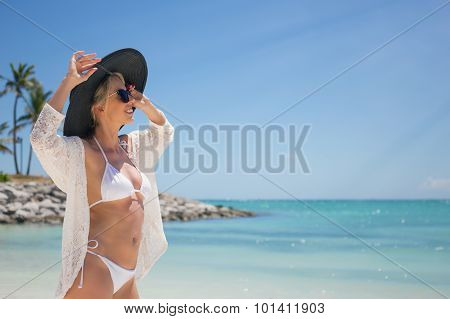 Woman enjoying holidays on the beach