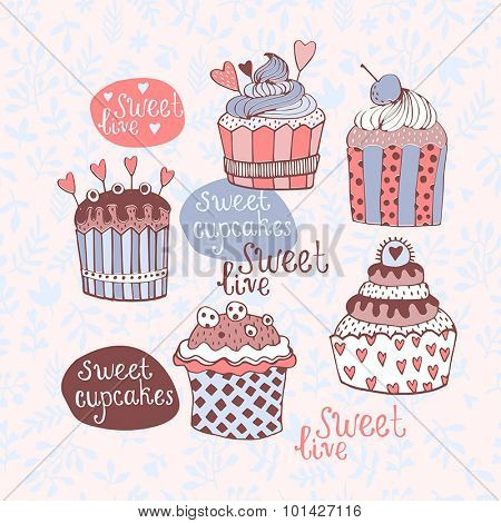 Vector set with decorated sweet cupcakes