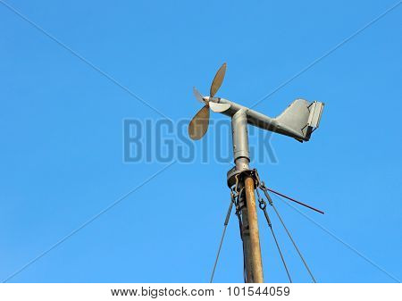 Vintage wind mill the background of blue sky