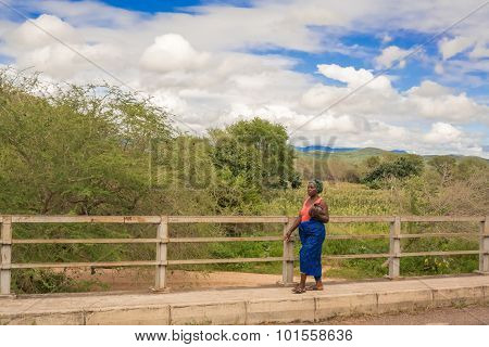 Woman At Sabi River Bridge, Malawi
