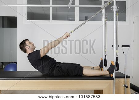 Man Doing Pilates In Cadillac.