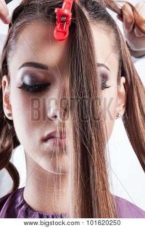 creating hairstyles in a hairdressing salon