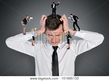 Young business man headache scream