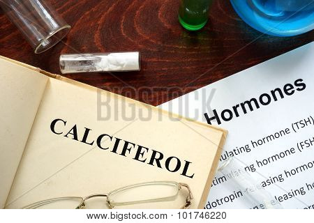 Hormone calciferol written on book.