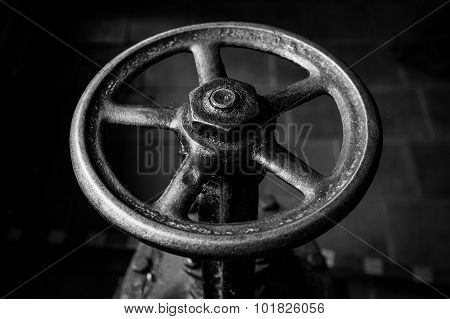 old handwheel of valve. Black and white