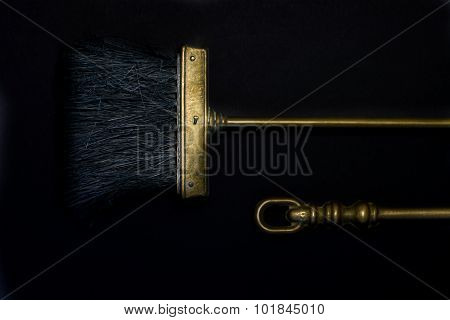 Gloden Small Cooper Broom On Black Background