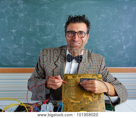 Nerd electronics technician retro teacher silly expression working in pcb