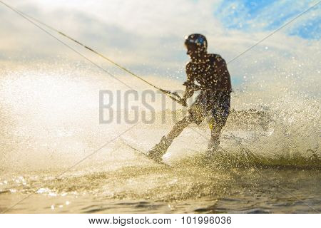 wakeboarder trains on the lake