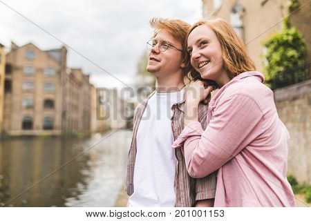 Red Hair Couple Portrait On Canalside