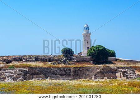 Antient greek amphitheater and lighthouse in Archaeological park at Kato Paphos, Cyprus