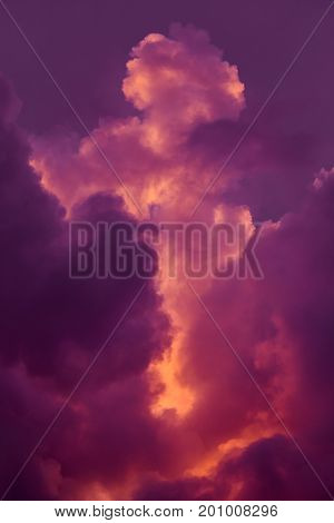 Magnificent colorful clouds in the evening sky. Bright pink clouds in the sky at sunset. Beautiful evening skyscape. Abstract purple pink background. Vibrant color photograph.