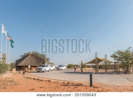 ETOSHA NATIONAL PARK NAMIBIA - JUNE 26 2017: Unidentified tourists in front of the information centre at the Olifantsrus Rest Camp in the Etosha National Park