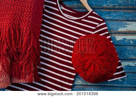 Overhead view of womenswear on wooden table