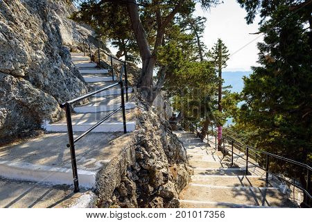 Road with 300 steps to Tsampika church on Rhodes island, Greece