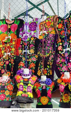 OAXACA MEXICO - MARCH 5: Traditional clothes for sale in a marketplace in Oaxaca Mexico on March 5 2017