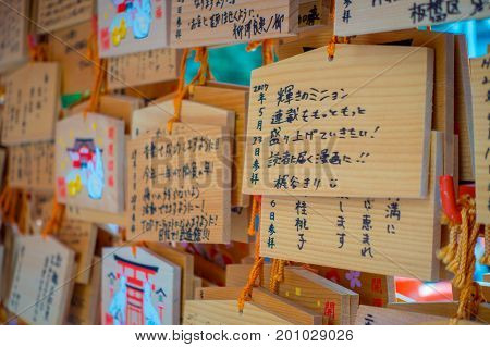 TOKYO, JAPAN JUNE 28 - 2017:Beautiful and small prayer tables at Toshogu Shrine. Ema are small wooden plaques used for wishes by shinto believers in Tokyo, Japan.