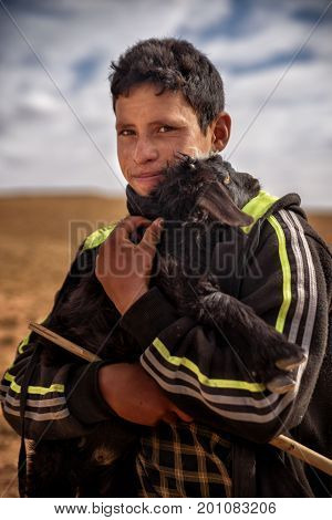 Nomad Boy With The Young Goat, Nomad Valley, Atlas Mountains, Morocco