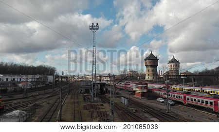 Large railway depo with trains with water towers