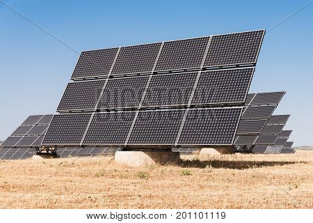 blue solar panels to generate power in Extremadura.