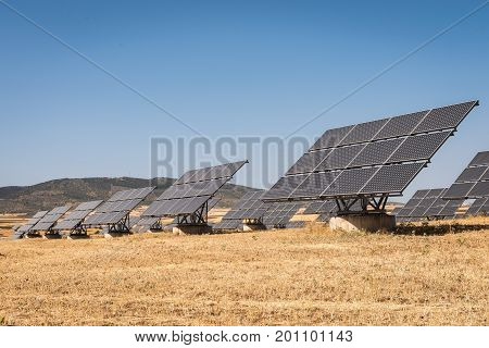 blue solar panels to generate power in Extremadura.