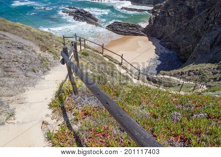 Stairs In The Cliffs To The Beach In Almograve