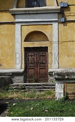 Kazakhstan, Ust-Kamenogorsk - 01, August 2017. The door of the old house. Architecture. Ancient architecture. Architectural background. Door. Front door. Old door.