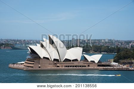 SYDNEY,NSW,AUSTRALIA-NOVEMBER 20,2016: Sydney Opera House at Bennelong Point with nautical vessels in Sydney, Australia