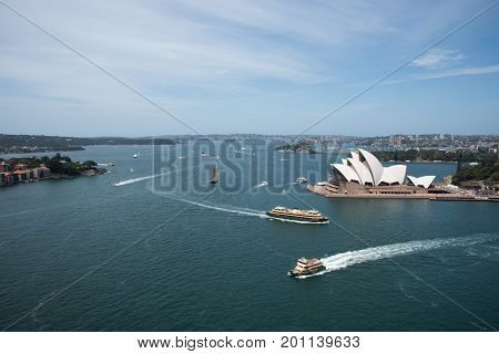 SYDNEY,NSW,AUSTRALIA-NOVEMBER 20,2016: Sydney Opera House at Bennelong Point with harbour traffic in Sydney, Australia