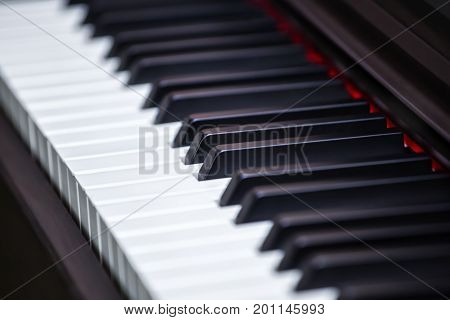Black and white piano keys close-up. Musical instruments.
