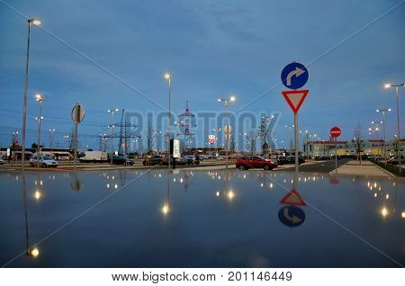 Parndorf Austria - June 20 2016: Parndorf parkplatz parking near shopping designer outlet shops in Austria