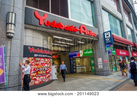 TOKYO, JAPAN JUNE 28 - 2017: Unidentified people in the enter of Yodobashi Camera department store. Yodobashi Camera is a chain store mainly selling electronic products with 21 stores in Japan.
