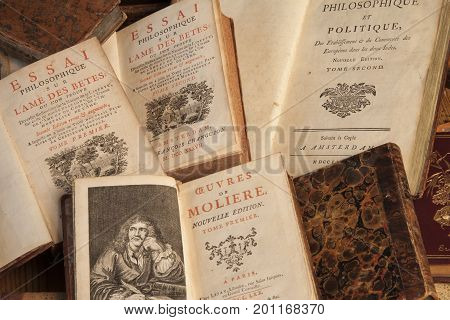Pile of vintage, antiquarian books with frontispiece illustrations. Copenhagen, August 14, 2010