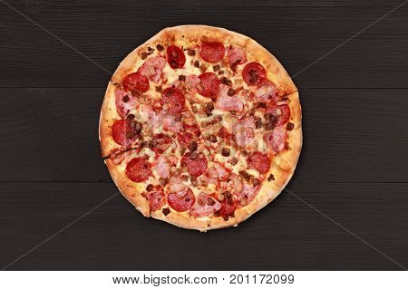 Pizza on wooden table top view. Fast food Delicious. Post blog social media. View from above with copy space. Banner template layout mockup top view on pizza. Pizza ready to eat.