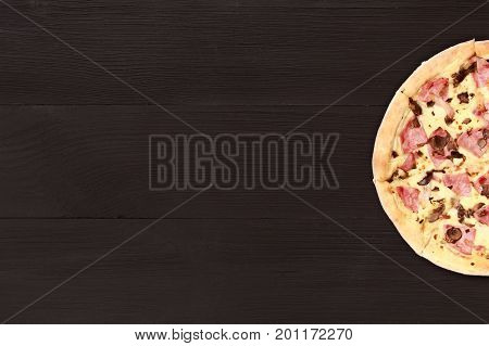 Pizza on wooden table top view. Fast food Delicious. Post blog social media. View from above with copy space. Banner template layout mockup top view on pizza. Pizza ready to eat.