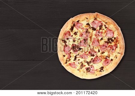 Pizza on wooden table top view. Fast food Delicious. Post blog social media. View from above with copy space. Banner template layout mockup top view on pizza. Pizza ready to eat.