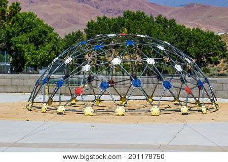 Semi Round Geometric Jungle Gym At Children's Playground